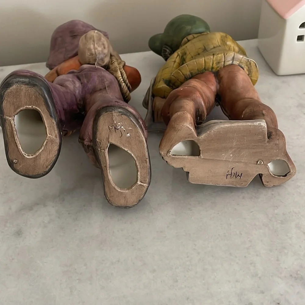 Paperboy and hobo ceramic figurines